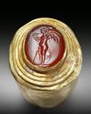 A GREEK GOLD AND CARNELIAN FINGER RING WITH CUPID, HELLENISTIC PERIOD, CIRCA 2ND-1ST CENTURY B.C.