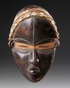 AN AFRICAN MASK, EARLY 20TH CENTURY