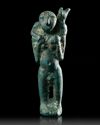 A WESTERN ASIATIC BRONZE STATUETTE OF MAN CARRYING AN ANIMAL, CIRCA 3RD MILLENNIUM B.C.