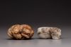 Two jade Buddhist lion carvings
