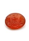 A ROMAN CARNELIAN INTAGLIO SHOWING AN EAGLE, SCORPION, ZEUS AMMON AND SERAPIS, 1ST-2ND CENTURY AD