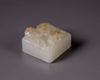 A small Chinese white jade 'chilong' seal