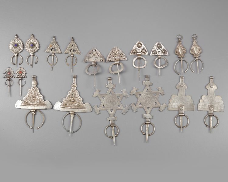 Nine pairs of Silver fibula's