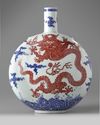 A Chinese underglaze blue and copper-red-decorated 'dragon' moonflask