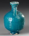 A TURQUOISE-BLUE GLAZED STORAGE JAR, PERSIA, 11TH CENTURY