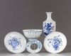A group of four blue and white items