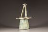A green-glazed pottery well