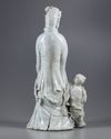 AN EXCEPTIONAL LARGE DEHUA GLAZED FIGURE OF A GUANYIN WITH A CHILD, 20TH CENTURY