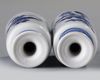 A pair of small Chinese blue and white rouleau vases
