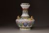 A polychrome porcelain vase