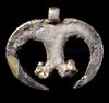 A WESTERN ASIATIC GOLD FOIL-COVERED SILVER LUNATE PENDANT, CIRCA 1ST CENTURY B.C.