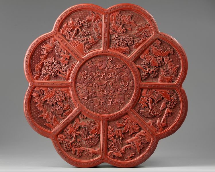 A LARGE CHINESE CINNABAR LACQUER FLORIFORM BOX AND COVER, QING DYNASTY (1644-1911)