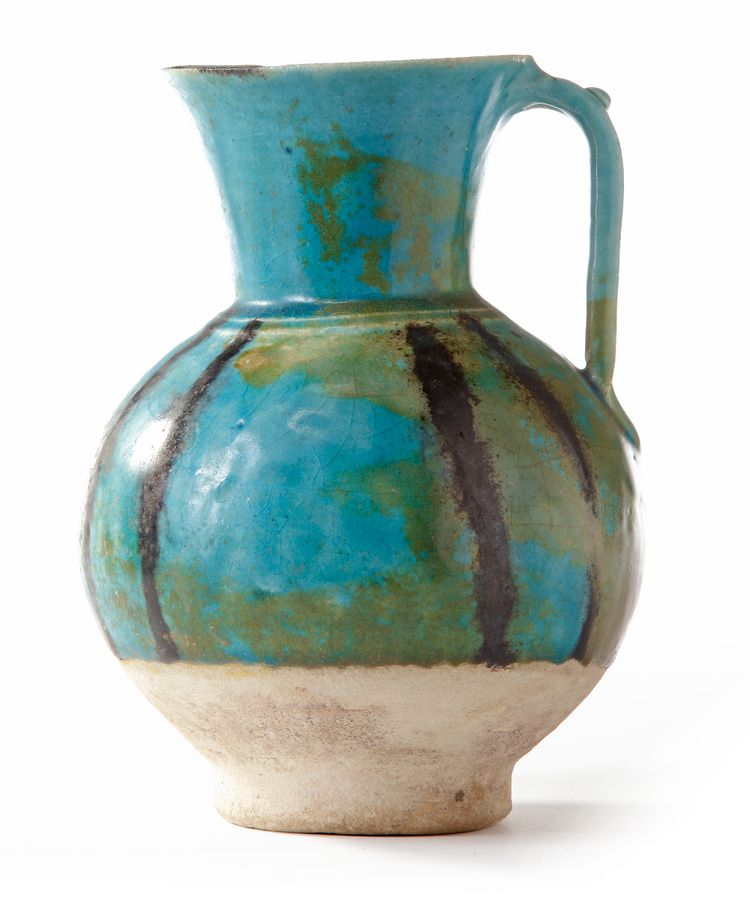 A RAQQA WARE VESSEL, SYRIA, FIRST HALF 13TH CENTURY