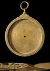 A BRASS ASTROLABE SIGNED BY MUḤAMMAD IBN FATTŪḤ AL-KHAMĀ’IRĪ, SEVILLE (SPAIN), DATED 625 AH / 1227–28 AD