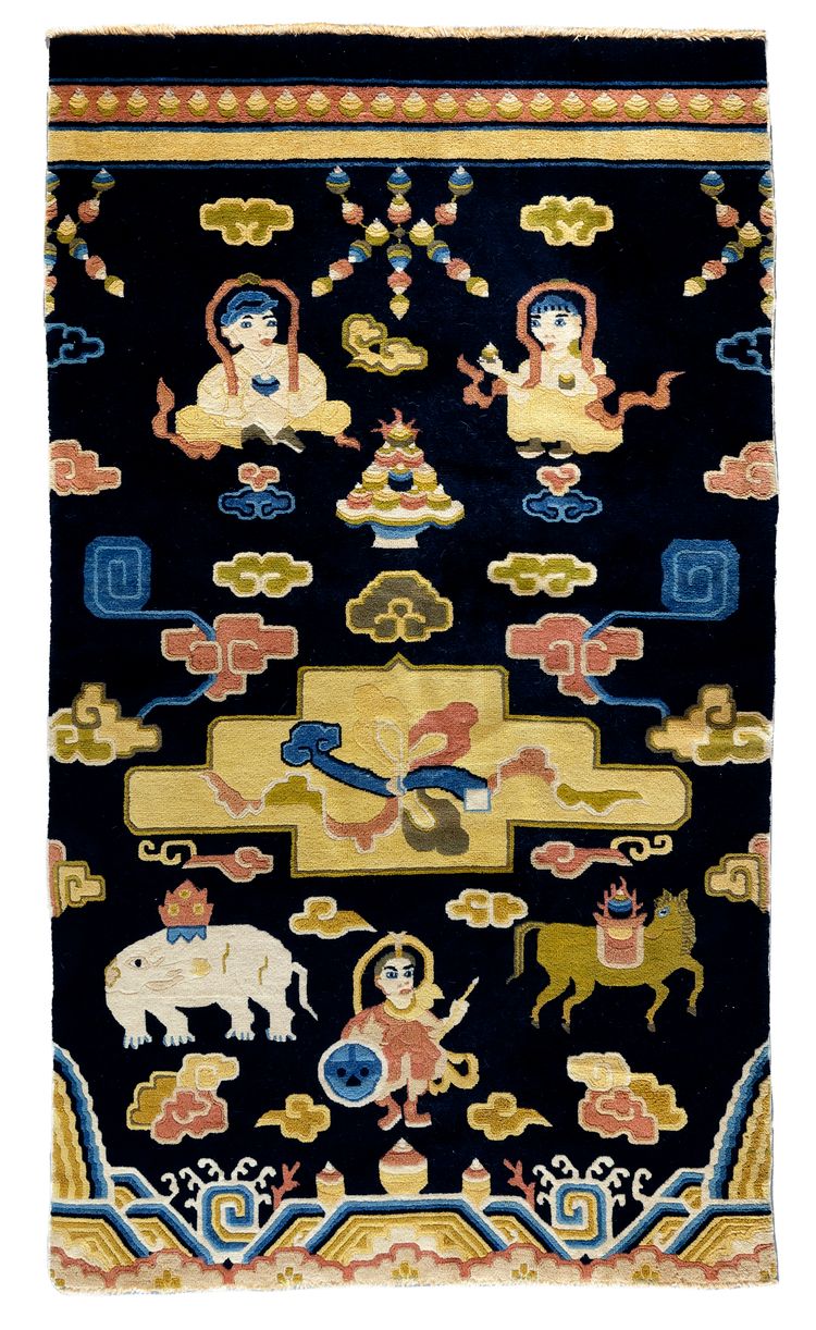 A CHINESE RUG, 20TH CENTURY