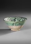 A KASHAN TURQUOISE AND BLACK POTTERY BOWL, PERSIA, 12TH-13TH CENTURY