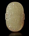 A CURVED YELLOW JADE ORNAMENT HAN DYNASTY, (206 BCE – 220 CE)