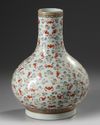 A Chinese famille rose 'bats and clouds' bottle vase