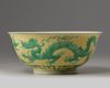 A Chinese yellow-ground green-enamelled eggshell porcelain 'dragon' bowl