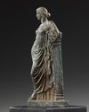 A ROMAN BRONZE STATUETTE OF APHRODITE / VENUS LEANING ON A PILLAR, CIRCA 1ST CENTURY B.C - A.D.