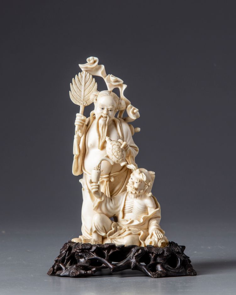 An ivory carving of Zhongli Quan and Li Tieguai