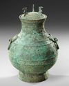 A CHINESE BRONZE RITUAL HU VASE, HAN DYNASTY (206 BC-220 AD) OR LATER