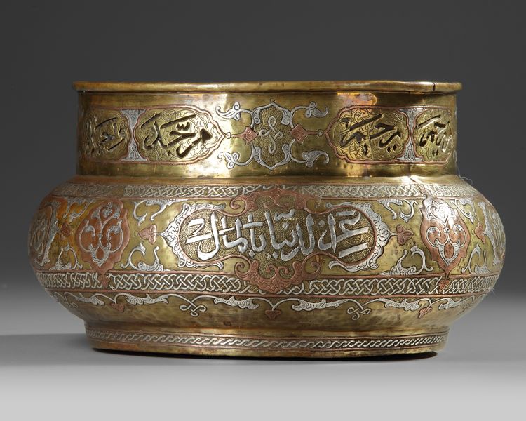 A CAIROWARE SILVER AND COPPER INLAID BRASS BOWL, EGYPT OR SYRIA, EARLY 20TH CENTURY
