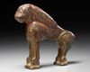 A BRONZE FATIMID MIRROR HANDLE IN THE FORM OF A LION, 11TH CENTURY