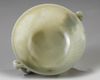 A CHINESE CELADON JADE 'POETIC' TWIN HANDLED BOWL, QING DYNASTY (1644-1911)
