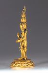 A Sino-Tibetan gilt bronze multi-headed Avalokitesvara