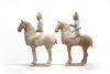 A pair of Chinese pottery equestrians