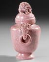 A CARVED PINK STONE LION VASE,  CHINA, 20TH CENTURY
