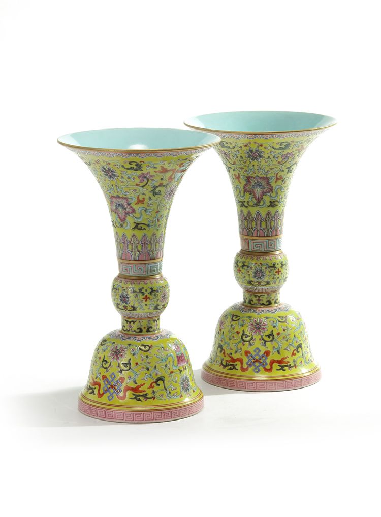 A pair of Chinese yellow-ground 'bajixiang' gu vases