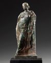 A ROMAN BRONZE STATUETTE OF APHRODITE / VENUS LEANING ON A PILLAR, CIRCA 1ST CENTURY B.C - A.D.