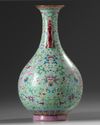 A Chinese turquoise-ground famille rose 'dragon and phoenix' vase