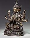 A Chinese cold-gilt bronze eight-armed Avalokitesvara
