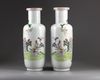 A pair of Chinese famille rose rouleau vases