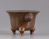 A Chinese bronze tripod censer