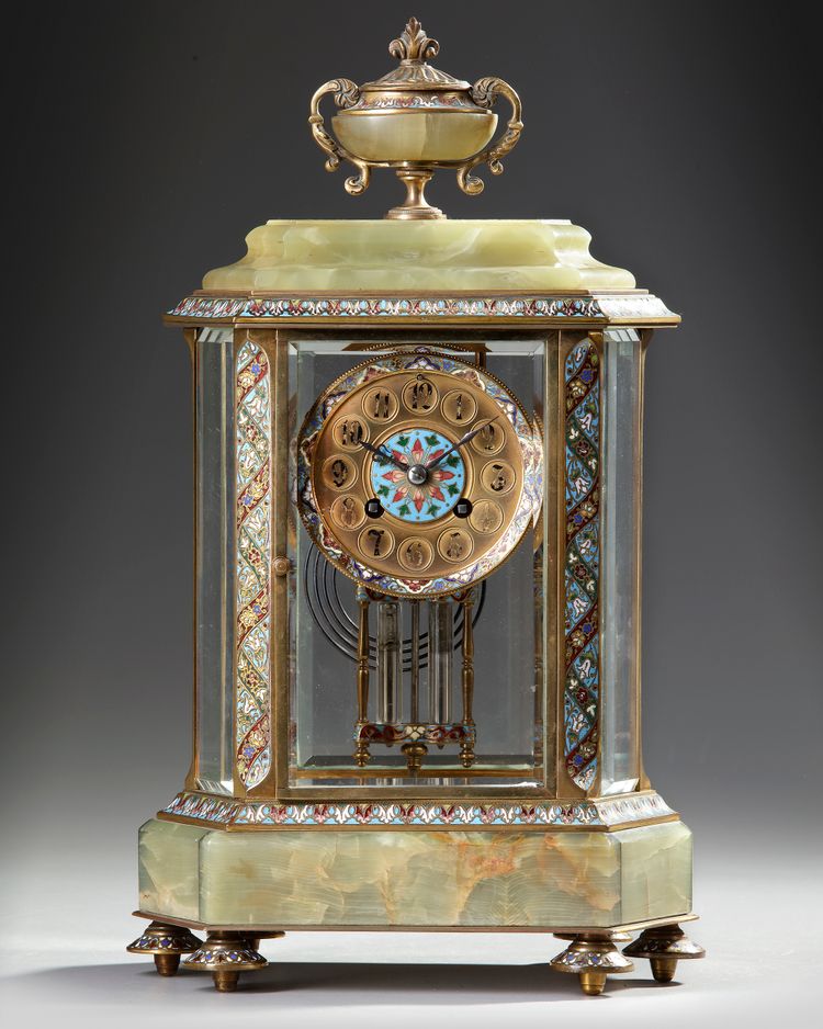 A FRENCH BRONZE AND CHAMPLEVÉ ENAMEL MANTEL CLOCK, 19TH  CENTURY