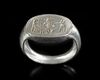 AN EGYPTIAN PALE ELECTRUM FINGER RING, NEW KINGDOM, CIRCA 16TH-11TH CENTURY B.C.