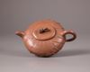 A Chinese yixing 'lotus-leaf' teapot and cover
