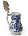 A JAPANESE BLUE AND WHITE JUG WITH SILVER COVER, 17TH CENTURY