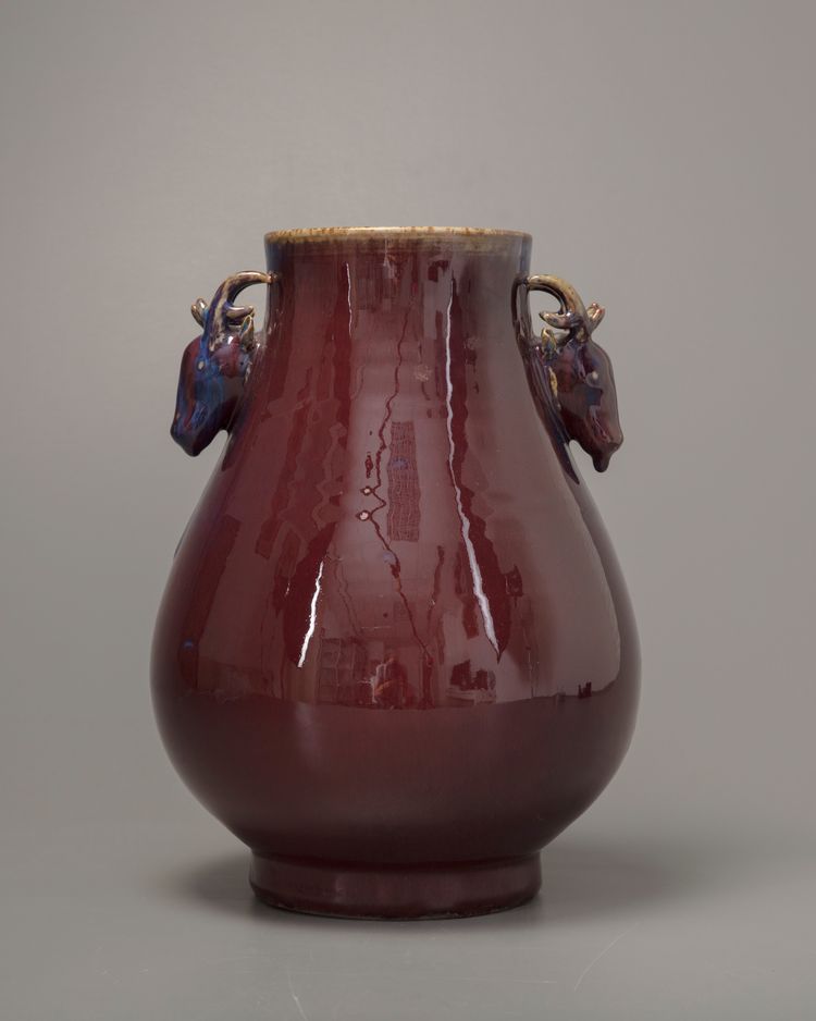 A Chinese flambé-glazed deer-handled vase. Hu
