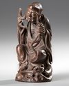 A CHINESE WOOD CARVING OF A LOHAN, 20TH CENTURY