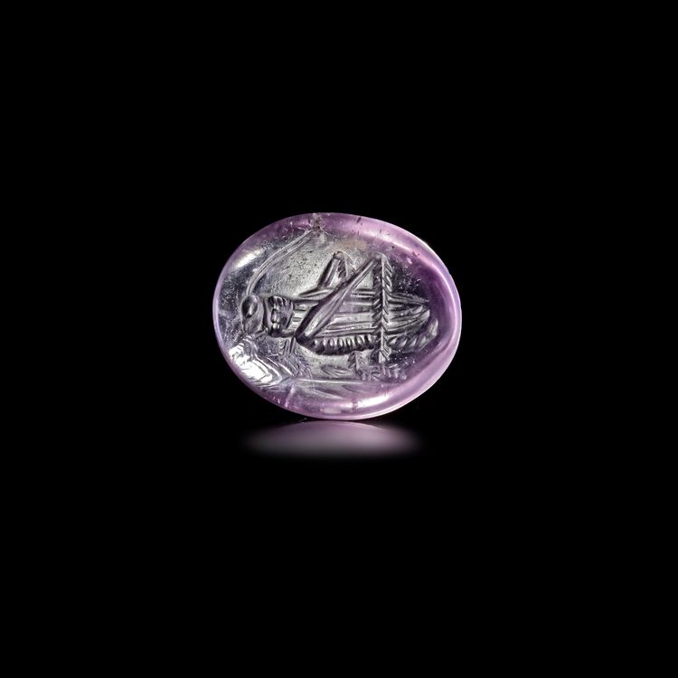 A HELLENISTIC AMETHYST GEM WITH GRASSHOPPER 200–100 BC
