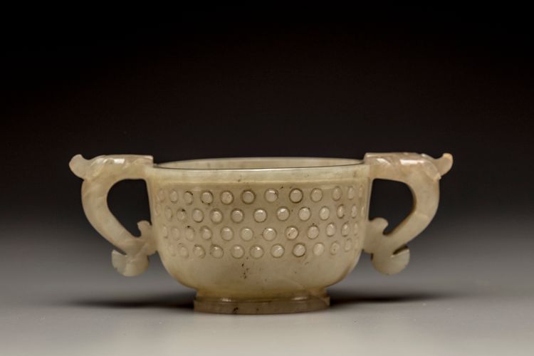 A celadon jade twin-handled cup