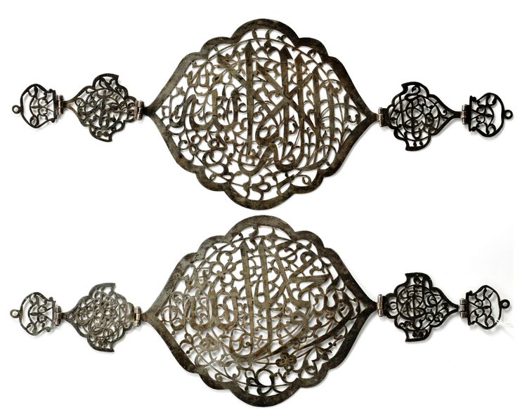 A PAIR OF SAVAFID STYLE CUT OUT STEEL PANELS, 19TH CENTURY