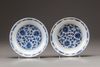 A pair of Chinese blue and white 'lotus' dishes