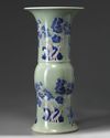 A Chinese celadon-ground blue and white and copper-red-decorated gu vase