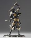 A Japanese bronze figure of a samurai